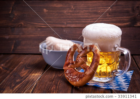 Oktoberfest food on wooden background Oktoberfest food on wooden background 33911341