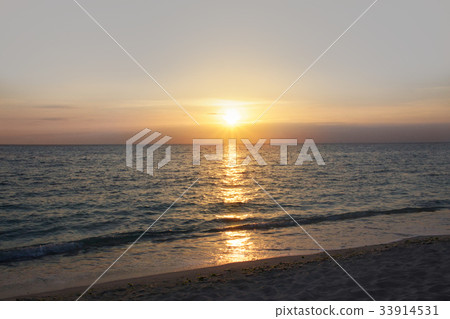 Background of sunrise / sunset beach of Okinawa which can be used for New Year's cards stock photos 33914531