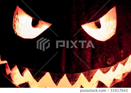 Spooky halloween pumpkin burning fire eyes mouth Spooky halloween pumpkin burning fire eyes mouth 33917643