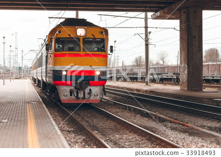 Yellow diesel train Yellow diesel train 33918493