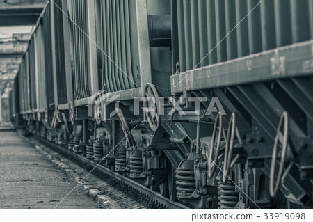 Green cargo wagons close up Green cargo wagons close up 33919098