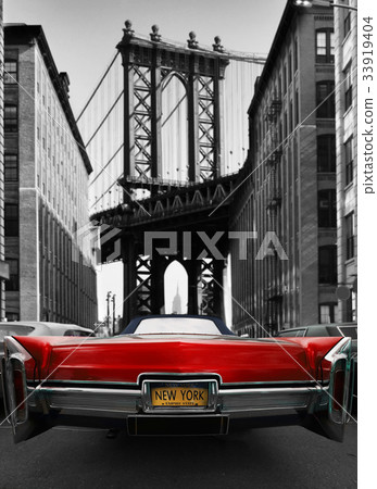 Retro old car red color on the road in New York 33919404