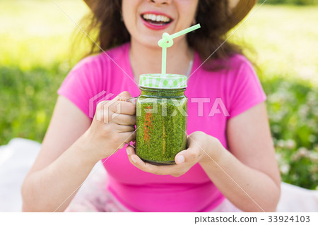 Close up of Young woman have fun in the park and 33924103