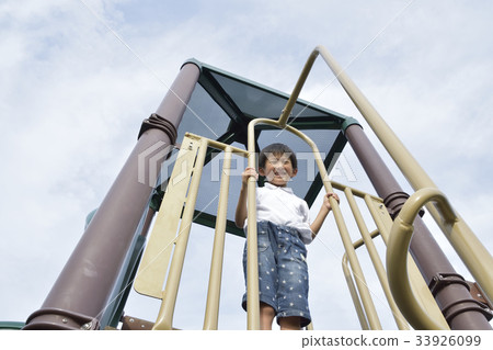 Boy playing with plaything Boy playing with plaything 33926099
