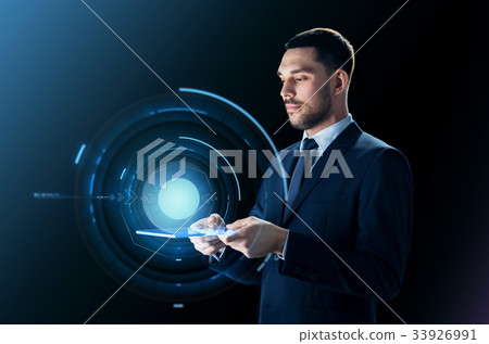 businessman with tablet pc and virtual projection 33926991
