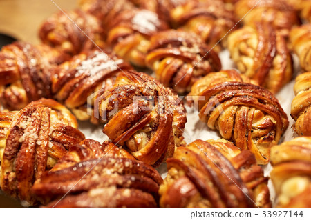 close up of buns or pies at bakery close up of buns or pies at bakery 33927144