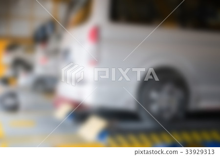 car in garage. vehicle maintenance in auto repair service. automobile annual checkup. fixing, checking concept. blur for background 33929313