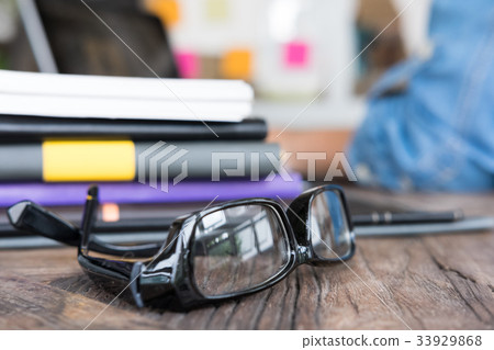 business people working with computer at workplace. young woman planning start up project at office. photographer retouching photo with laptop. business people working with computer at workplace. young woman planning start up project at office. photographer retouching photo with laptop. 33929868