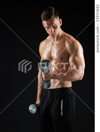 man with dumbbells exercising 33931682