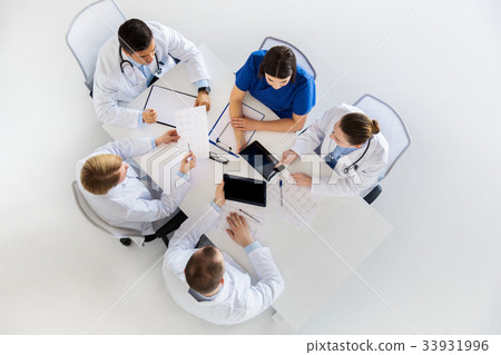 doctors with cardiograms and tablet pc at hospital doctors with cardiograms and tablet pc at hospital 33931996