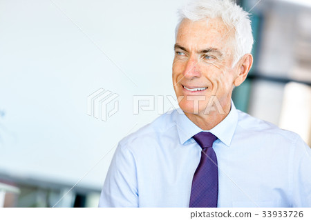 Businessman at the office Businessman at the office 33933726