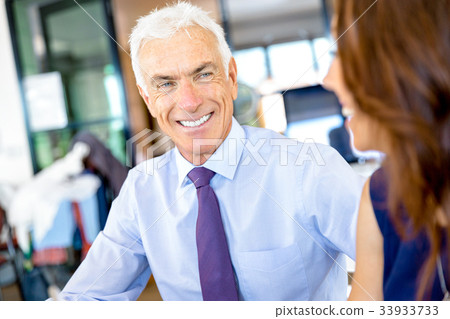 Businessman at the office Businessman at the office 33933733