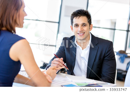 Businessman at the office Businessman at the office 33933747