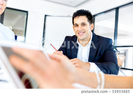 Businessman at the office 33933885