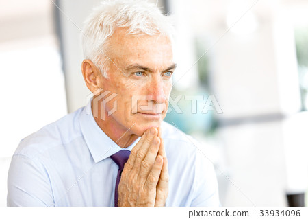 Businessman at the office Businessman at the office 33934096