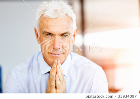 Businessman at the office Businessman at the office 33934097
