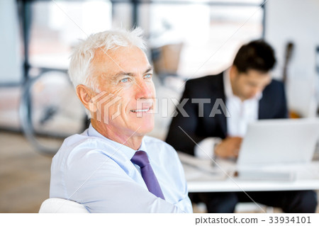Businessman at the office Businessman at the office 33934101
