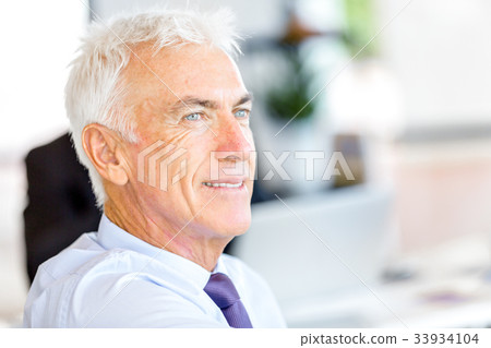 Businessman at the office Businessman at the office 33934104