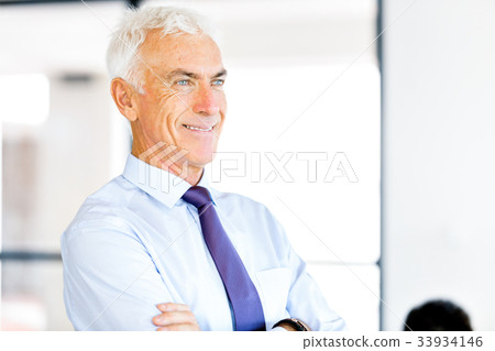 Businessman at the office Businessman at the office 33934146