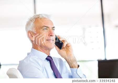 Businessman at the office Businessman at the office 33934148