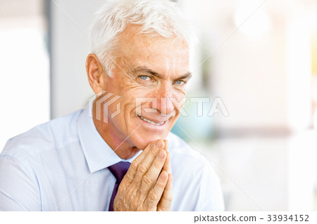 Businessman at the office Businessman at the office 33934152