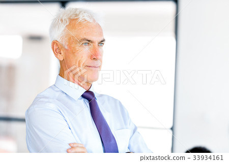 Businessman at the office Businessman at the office 33934161