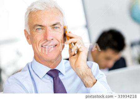 Businessman at the office Businessman at the office 33934218