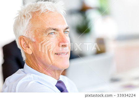 Businessman at the office Businessman at the office 33934224