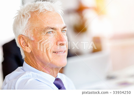 Businessman at the office Businessman at the office 33934250
