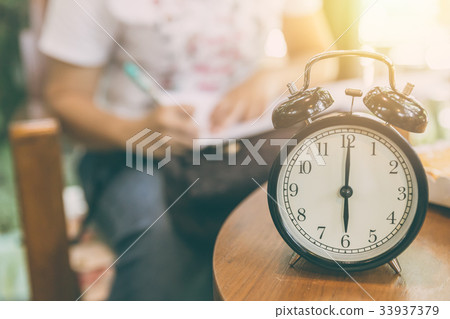 time for working concept. clock timed at 8 o'clock time for working concept. clock timed at 8 o'clock 33937379