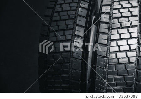 Clean Truck Tyre, black new shiny car tire Clean Truck Tyre, black new shiny car tire 33937388