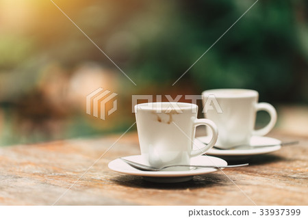 two cup of espresso on wood table 33937399