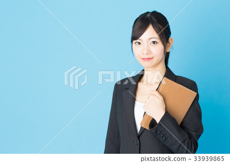 Business woman blue back image Business woman blue back image 33939865