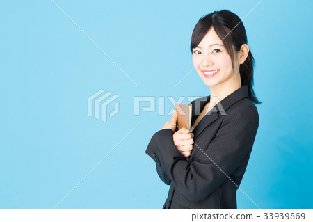 Business woman blue back image Business woman blue back image 33939869