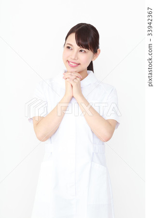 Young nurse holding hands 33942367