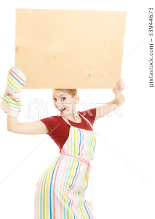 housewife holds wooden board with copy space housewife holds wooden board with copy space 33944673