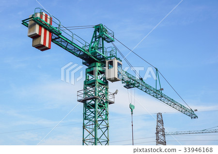 crane tower on sky background at construction site 33946168