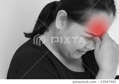stressed middle aged woman with headache, tension stressed middle aged woman with headache, tension 33947405