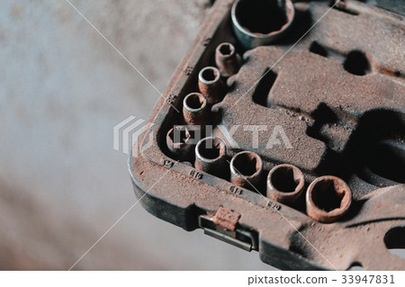 Set of old and rusty socket wrench. 33947831