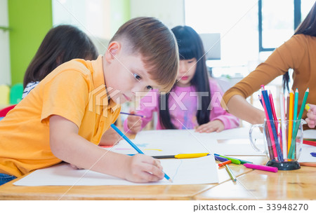 Preschool kids drawing with color pencil Preschool kids drawing with color pencil 33948270