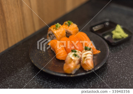 Japanese food in set different types of sushi Japanese food in set different types of sushi 33948356