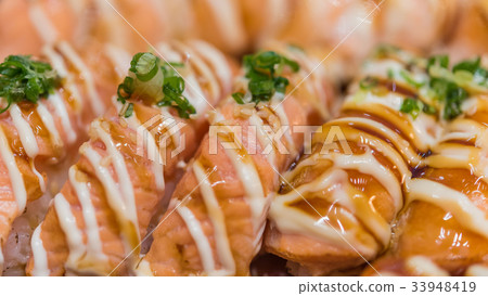 Japanese food in set different types of sushi Japanese food in set different types of sushi 33948419