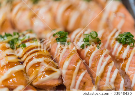 Japanese food in set different types of sushi Japanese food in set different types of sushi 33948420