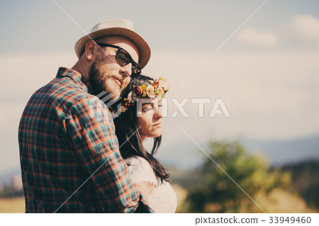 Love, tender, dreamy, sweet young couple hugging Love, tender, dreamy, sweet young couple hugging 33949460