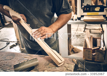 Manufacture of guitars of the brand Woodstock. 33952067