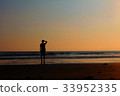 Sunset seaside 33952335