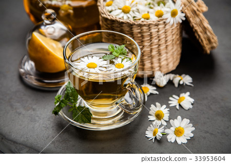 Cup of chamomile tea Cup of chamomile tea 33953604
