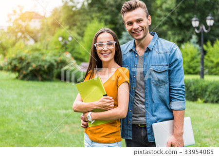 Cheerful man and woman resting in nature after Cheerful man and woman resting in nature after 33954085
