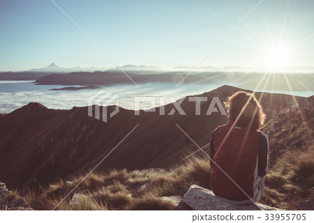 Female hiker reaching her goal 33955705