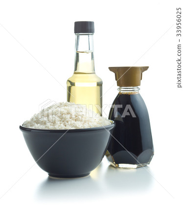 Sushi rice, soy sauce and vinegar. Sushi rice, soy sauce and vinegar. 33956025